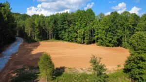Graded building pad and gravel driveway near Temple, Georgia
